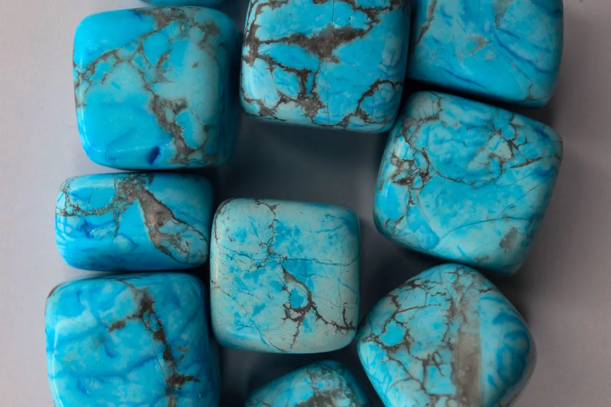 Blue turquoise stones with dark matrix veins