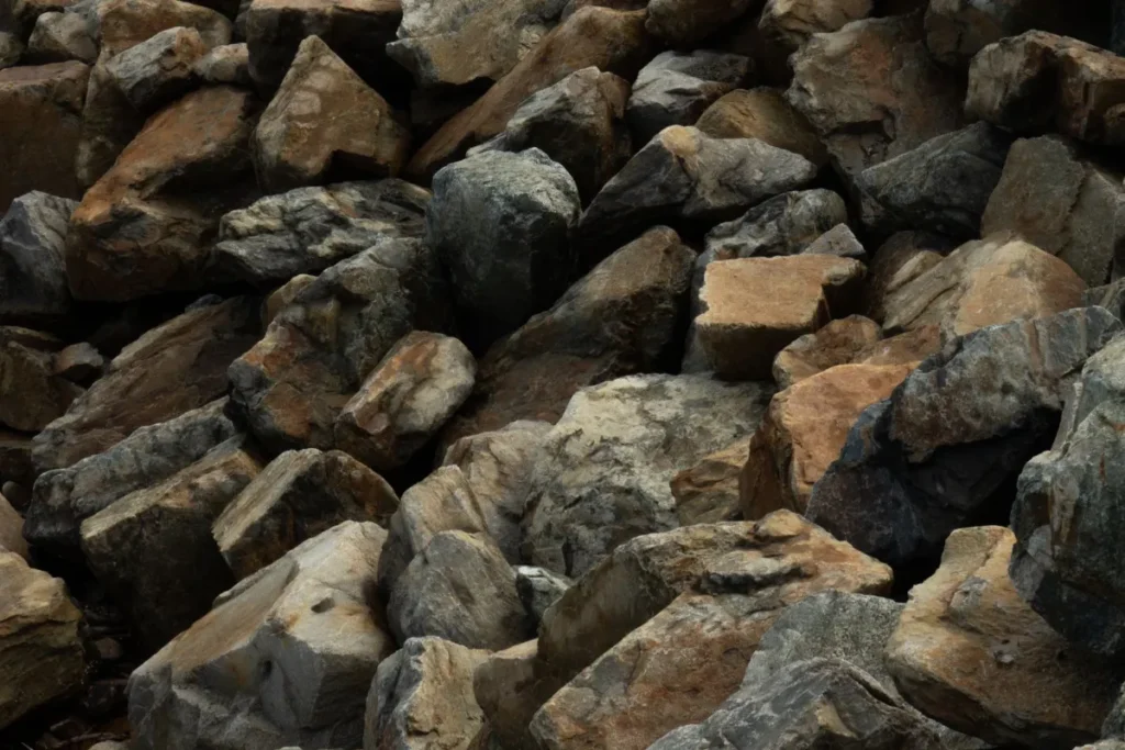 Pile of rough, angular rock ready for a first tumbling batch